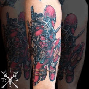 Deadpool piece (red is all healed, white and browns are fresh),  done by DannyScottTattooArtist