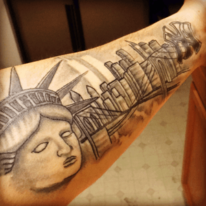 New York skyline tattoo, raised in Bronx, NY I witnessed first hamd the 9/11 attacks as a kid. My uncle died that day serving as a cop to the state. It was my first piece for my 9/11 memorial sleeve. #911 #neverforget #home #memorial #newyorkcity 