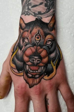 My #neotraditional #handtattoo #neotraditionalhandtattoo #neotraditionalwolf by Justin Kennon at Saint Louis Tattoo Company