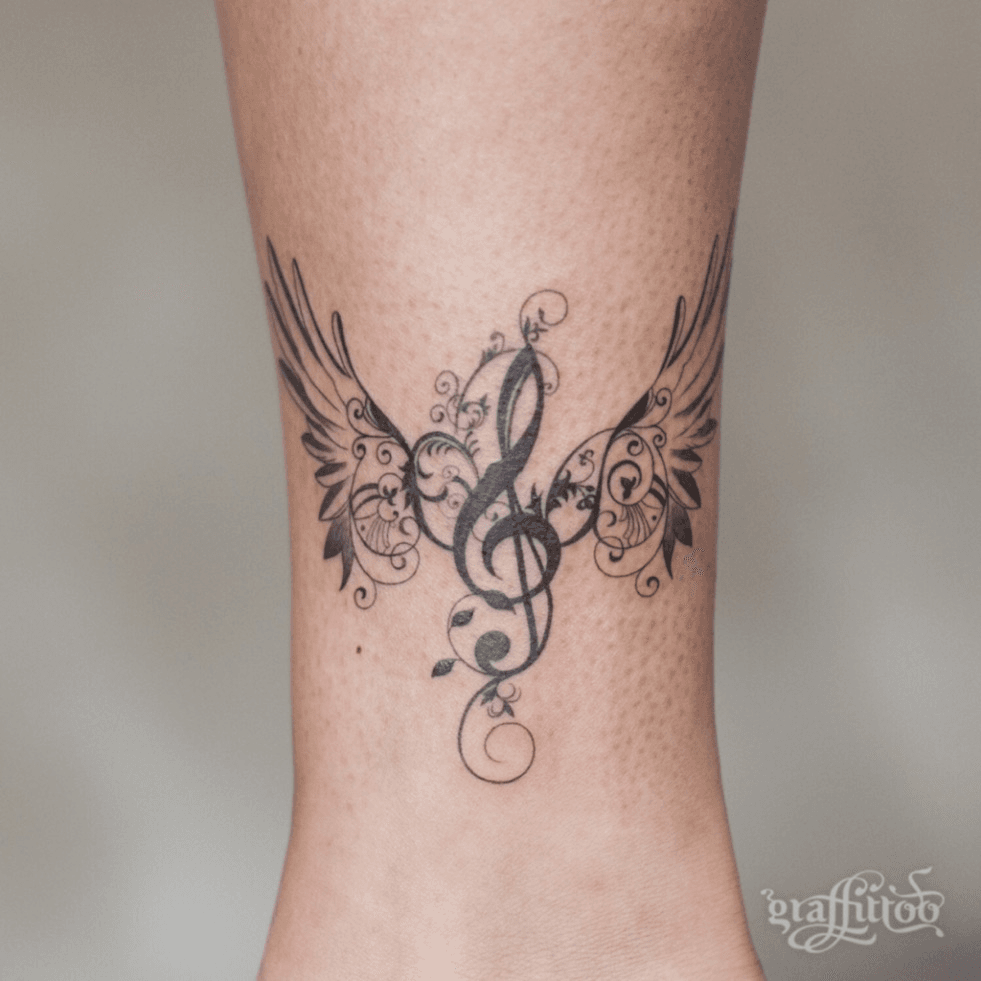 Bass Clef tattoo by Miguel Angel tattoo, via Flickr | Tattoos, Cool tattoos,  Geometric tattoo design