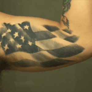 Under arm flag tatto by Magel Palimeno