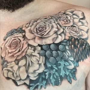 A portion of the fowers from my wife's bouquet on our wedding day! #tattoo #chesttattoo #flowertattoo #meaningful #love #bestdayever 