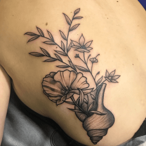 Sea shell and flowers tattoo i did.  Follow @emolina_nyc 