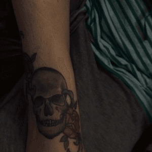 Skull and roses tattoo done by Malarie at Electric Dagger in jackson MS