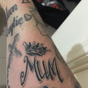 Freshly done 'mum' tattoo with a crown