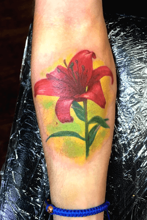 Red #lily #floral tattoo by Lauren Leininger