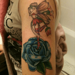 Cheeky fairy and blue rose, an old one now