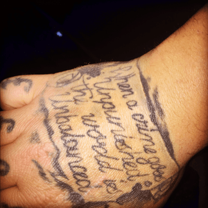 Right hand tattoo. (When a crime goes unpunished the world is unbalanced )