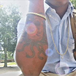 Right arm, tattoo of medusa