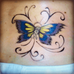 This is a cover up. It was an infinity symbol. Now a #butterfly 