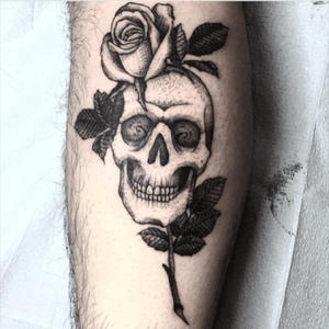 Skull and rose by Andrew