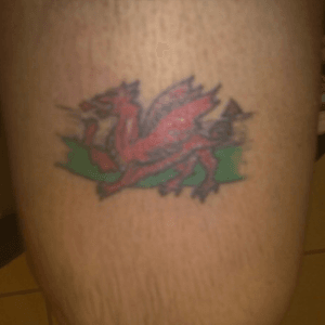 Wanted a tattoo that would show when i wore shorts. Its above my right knee and symbolises my national flag. 