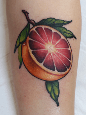 Super fun grapefruit tattoo. 