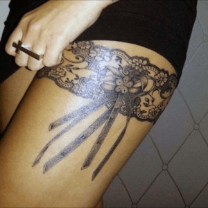 Garter tattoo
