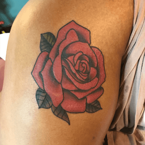 A beautiful rose done by Jon Larson of Depot Town Tattoo in Ypsilanti, MI .