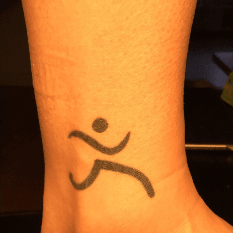 runner girl stick figure tattoo