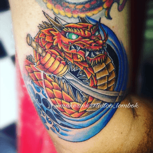 Done this dragon by our artist : @yudiecot_ #tattoo #tattoos #tattooed #tattooartist #tattoolife #tattooink #tattoomagazine #tattoodesign #tattooart #ink #inked #inkstagram #inkaddict #inklife #inkedlife #lombok #lomboktattoo #wonderfulllombok #lomboktattoostudio #besttattoo #nicetattoo #besttattooartist #tattooartist #indonesia #indonesiatattoo #indonesiatattooartist #dragontattoo #colourtattoo #newschooltattoo