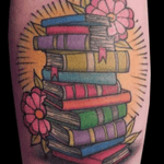 I would love to get a more realistic stack of books in full color. Maybe with the names of some of my favorite books on the sides. #megandreamtattoo