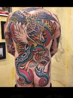 Awesome traditional backpiece by Gordon Combs #traditional #backtattoo #eagle #snake 