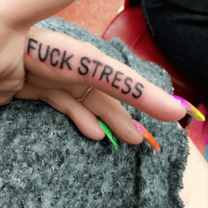 Done by Fernando Lions @lions_nyc at Flyrite Tattoo in Brooklyn, NY. #lettering #fuckstress #fingertattoo 