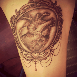 Photo is a little warped, but this is the newest addition. #hearttattoo #anatomicalheart #thightattoo