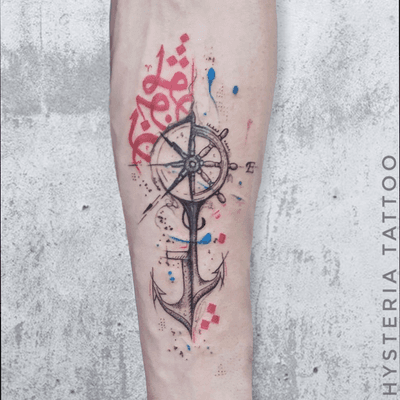 ship wheel and anchor tattoo