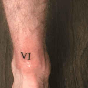 Lucky number 6, Done in New Found Glory. #VI #romannumerals #tattoo #ankle #shin #minimal 