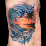 A #wave and #dolphin tattoo i did to represent my client and his son. #wavetattoo #tropical #palmtree #subset #waves #beach #dolphins #underwater #ribs #side #large #color #colour #realism #realistic #wildlife #tropics #colourful #amazing #beautiful #painting #painterly #electrum #intenze #neotat #ohanaorganics #lizvenom #helios #painfulpleasures #melbourne #australia #edmonton #canada 