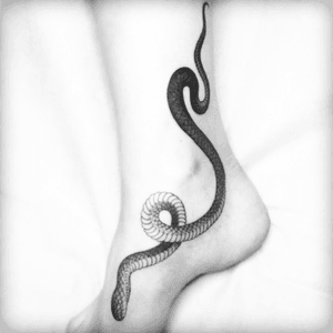 Wiggle this around my ankle pls! #dreamtattoo #snake #blackwork by @nathan_kostechko