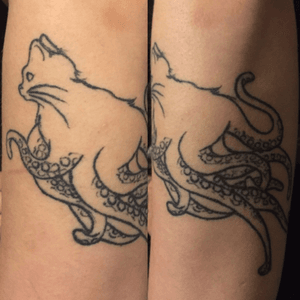 An Octokitty tattooed and designed by Ken Castro. #cat #octopus #octopussy #007 #animal #surreal #halfsleevestart #studioghibli #cutecritter #simplistic #surrealistictattoo #animation 