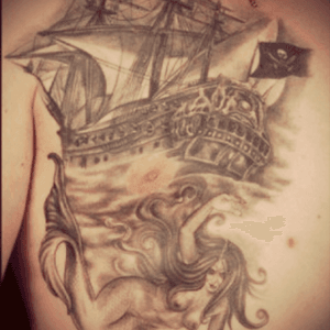 #meagandreamtattoo i want something like this on my rib but with a bar wench laying on gold holding the ship up #meagandreamtattoo 