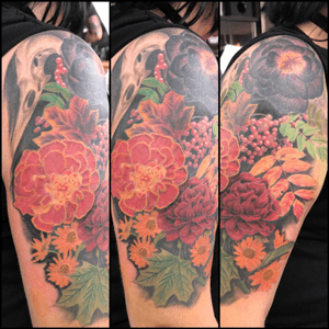 Work in progress realistic colour flower tattoo with bird skull #flowers #flowertattoo #realistictattoo #birdskulltattoo #birdskull #girlytattoo #sleevetattoo 