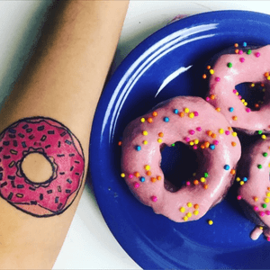 Pink sprinkled Donut. 