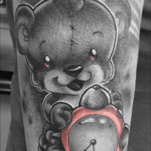 Freshly done in this picture. Teddy holding clock showing time of birth of my little one. Done by Blaine Cellerdoor Rose in Berlin #teddy #teddybear #clock #comictattoo #cartoon #cute #daughter  #welove 