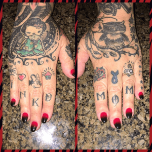 Inkd Mom tattooed on my fungers