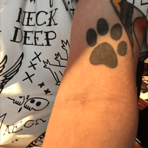 Done by carly at first string tattoo. #pawprint #dog #blackwork #winnipeg 