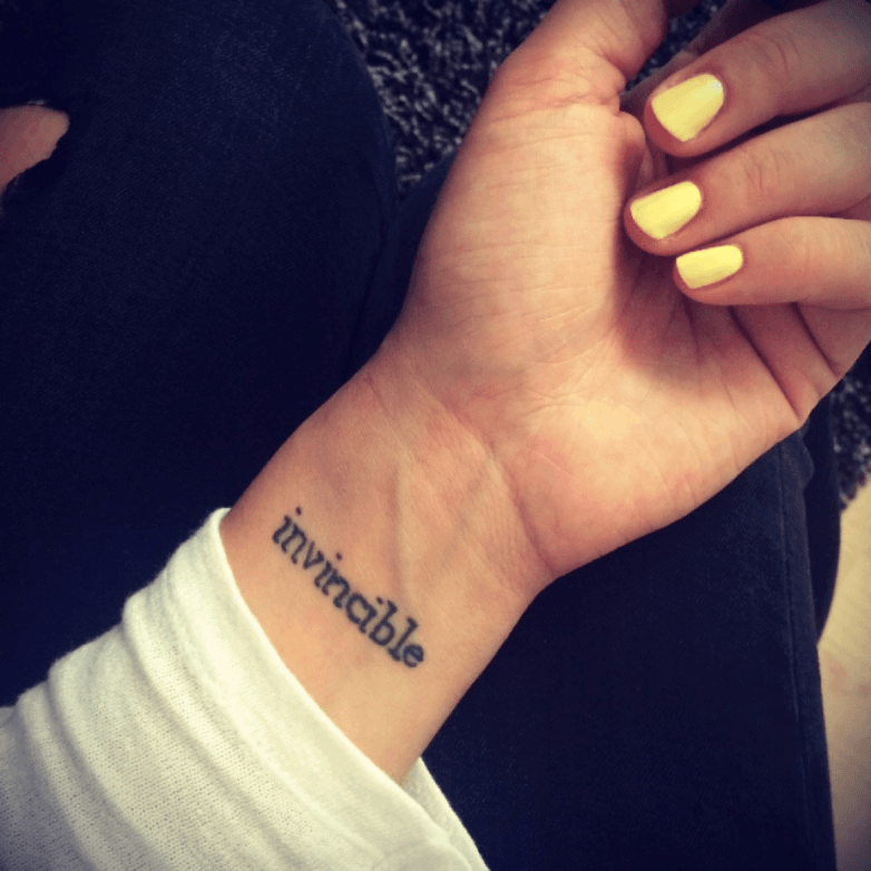 Invincible  Tattoos and piercings Tattoo quotes Tattoos
