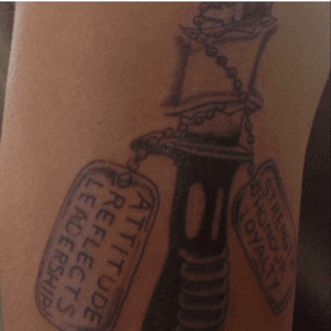 One of my proudest tattoo..........a bayonet with dog-tags wrapped around it ......... I'm a soldier to the end....... One dog-tag has the motto that i live by "Attitude Reflects Leadership"............the other dog-tag has "Strength Honour Loyalty"........