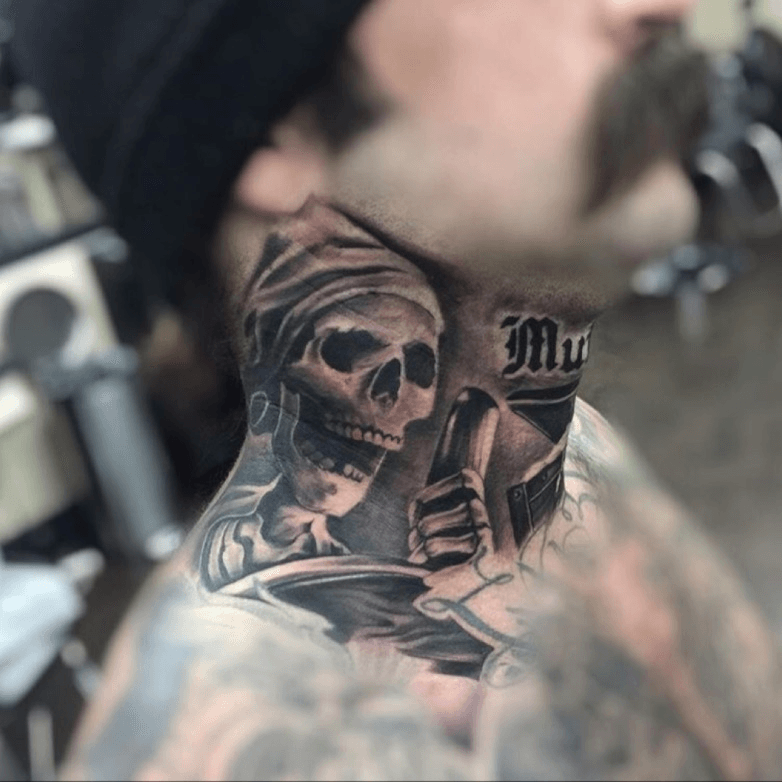 skull neck piece by David Vallejo TattooNOW