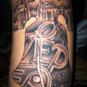 My fiance's tattoo on his upper arm of our home city philadelphia. 