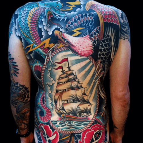 Love this backpiece done by @timhendricks #traditional #backpiece #sailor #ship #snake #eagle 