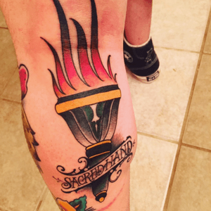 Torch. Courtesy of @bigmeas, Saced Hand Tattoo Society, Columbus. 