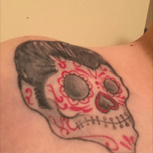 Rockabilly style, with sugar skull for my Mexican heritage.