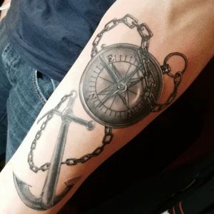 Compass attached to an anchor