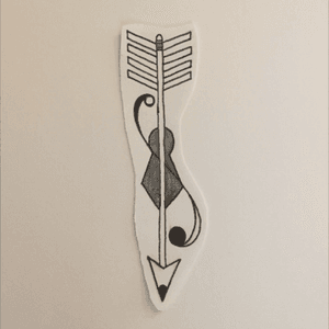 Personal arrow tattoo design