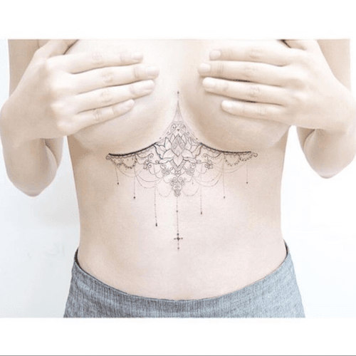Underboob lace tattoo