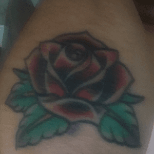 Rose tattoo orignally done by Scott Marshall at vanity tattoo. Rose leafs and touch up done by Noodles at Noodles tattoo