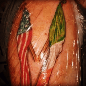 This is one of the tattoos i would like ot get. The only difference is having Michagan J Frog standing in the middle holding both flags.