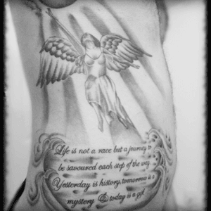 My Angel done on my left side of my ribs. The saying I should live by #dreamtattoo
