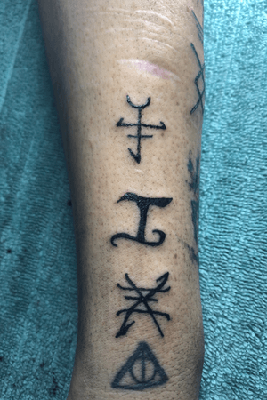 2 Greek symbols and 1 Elvish on my girl